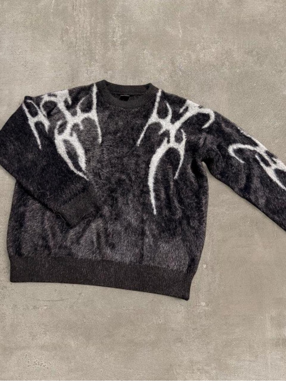 Black Fuzzy Sweater with White Abstract Flame Accents